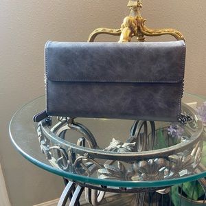 Women’s grey clutch/shoulder bag